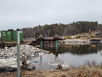 Looking from George Wright Rd at work on temporary roadway and installation of the pile bent pier #1 for the temporary Pleasant Cove bridge.